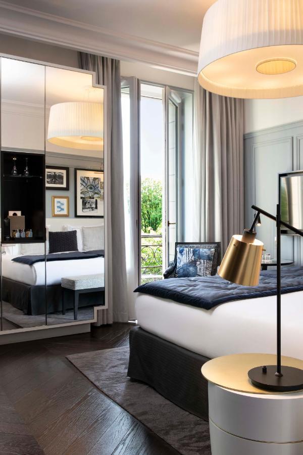 Le Damantin Hôtel&Spa Parijs Buitenkant foto A room at the hotel