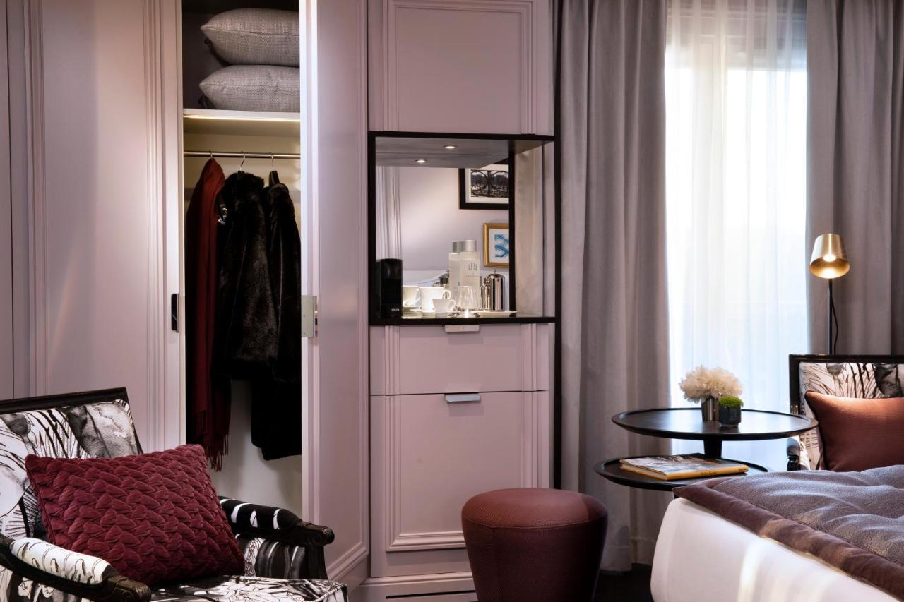 Le Damantin Hôtel&Spa Parijs Buitenkant foto A room at the hotel