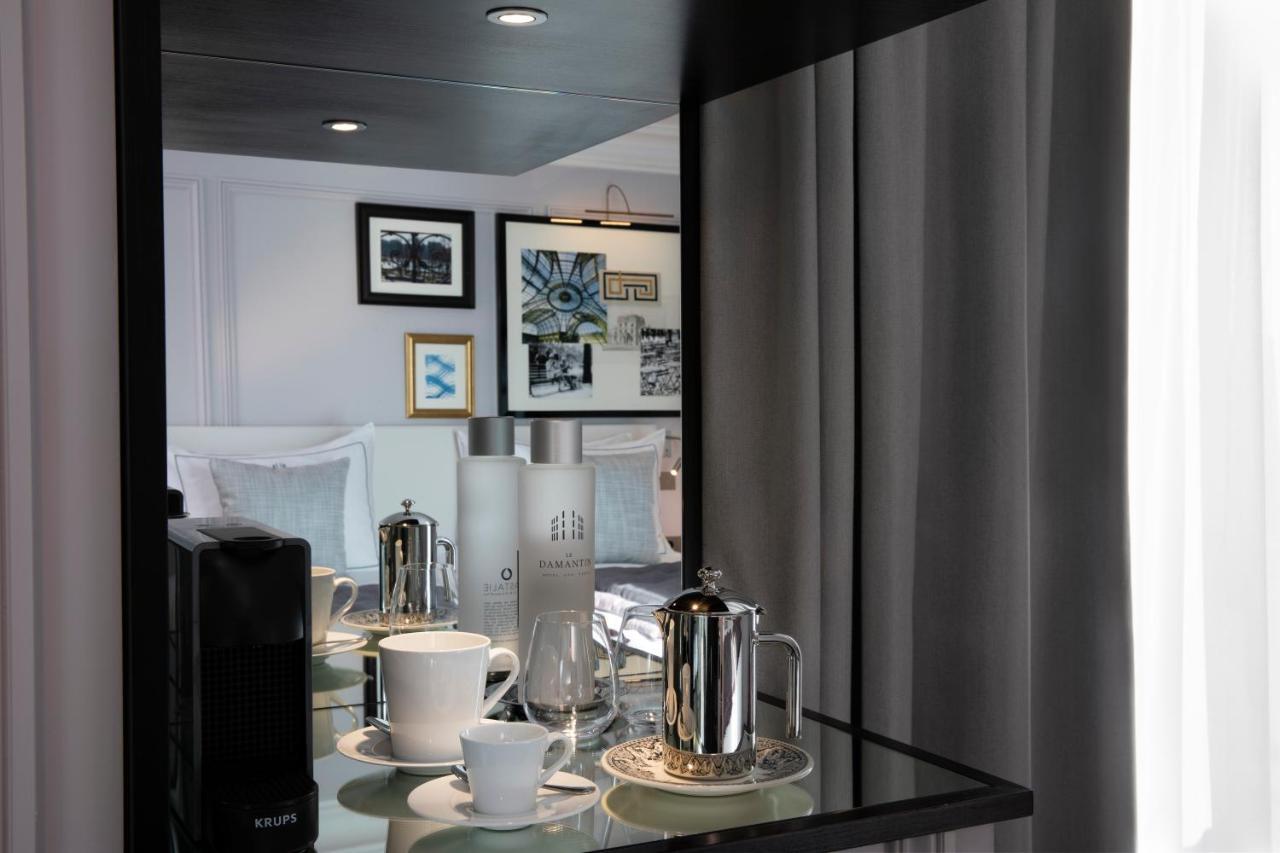 Le Damantin Hôtel&Spa Parijs Buitenkant foto A coffee set