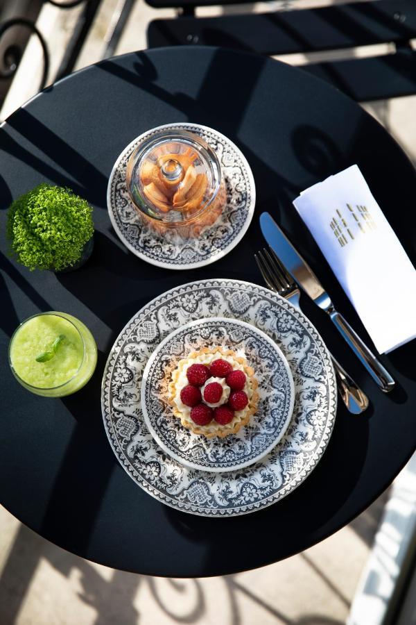 Le Damantin Hôtel&Spa Parijs Buitenkant foto A dessert