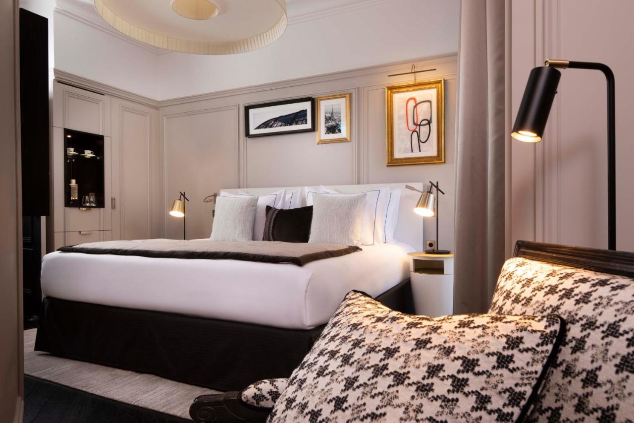 Le Damantin Hôtel&Spa Parijs Buitenkant foto A bedroom at the hotel