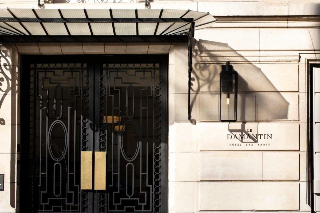 Le Damantin Hôtel&Spa Parijs Buitenkant foto The entrance to the Dalmantin Hotel