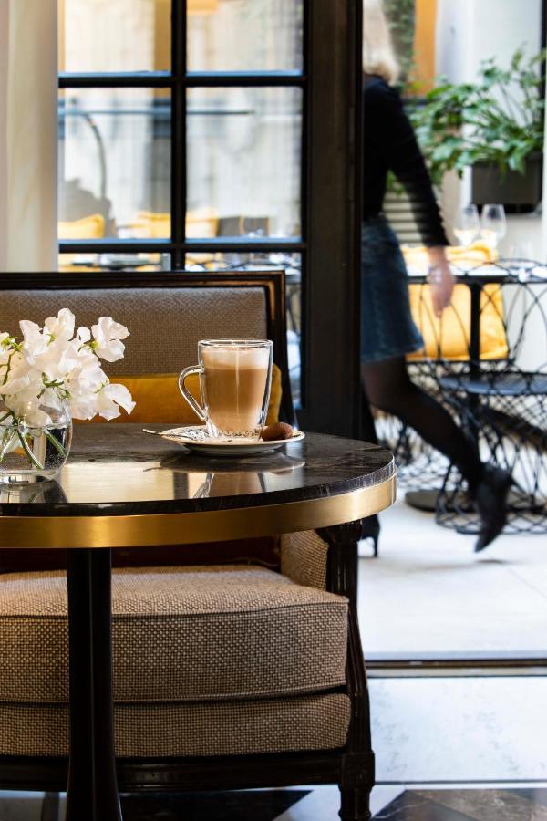 Le Damantin Hôtel&Spa Parijs Buitenkant foto Café