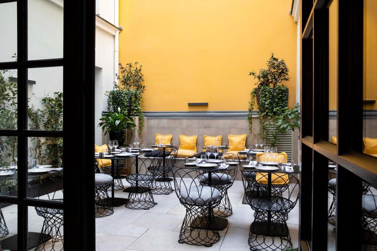 Le Damantin Hôtel&Spa Parijs Buitenkant foto The restaurant's courtyard